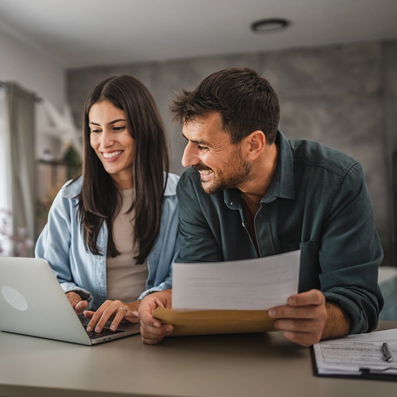 Melbourne family discussing their owner occupied home loan options with a mortgage broker