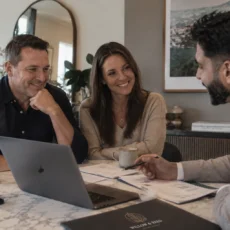 Melbourne couple reviewing a debt recycling strategy with their mortgage broker to turn home loan debt into wealth-building investment debt